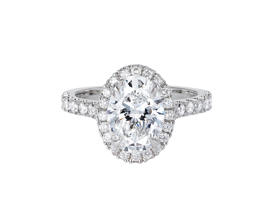 A.G oval cut diamond halo setting with split bead half diamond band.