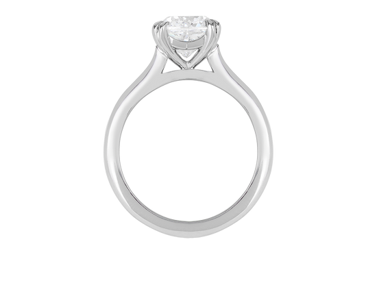 A.G cushion cut solitaire double claw setting with half round band. 