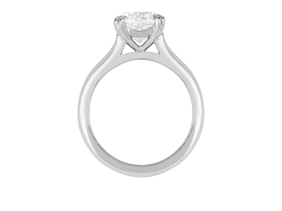 Front view of A.G cushion cut solitaire double claw setting with half round band. 