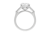 Front view of A.G round brilliant cut and tapered baguette diamond trilogy engagement ring. 
